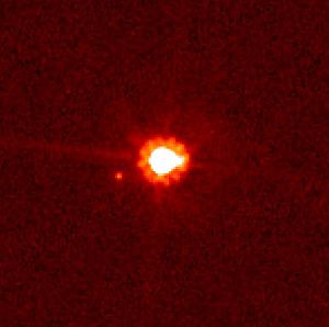 The dwarf planet Eris, with its moon, Dysnomia