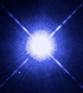 A white dwarf star (the tiny dot lower left)